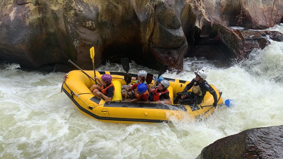 Group of young people at The Wave white water rafting.