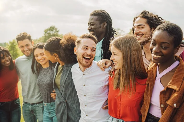 Group of young friends of different races and cultures have carefree fun