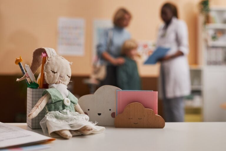 Toy on table in counsellor's office, concept of childhood trauma and mental health
