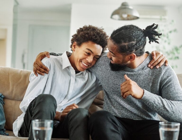 father and son spending time together, concept of family support for teenage mental health