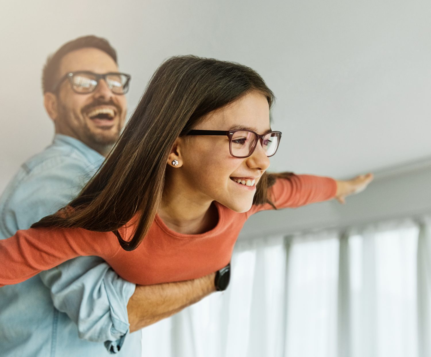 young daughter having quality time with father, concept of parenting