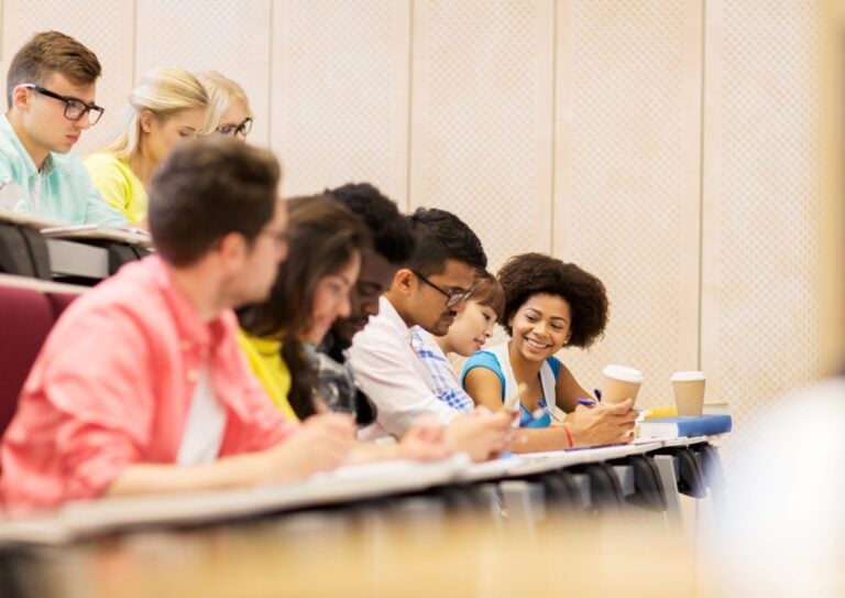 group of students sitting in a classroom