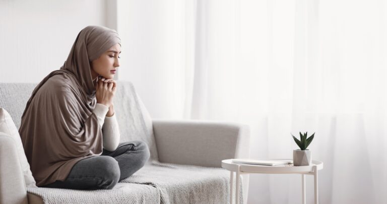 teenage girl looking depressed while sitting at home, concept of mental health
