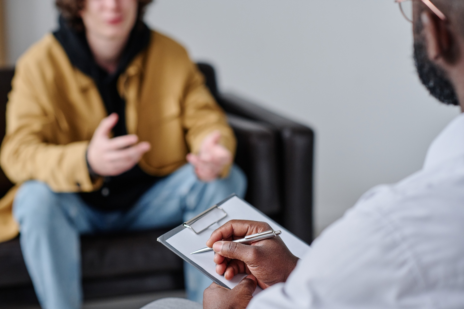 Person Talking with Therapist at Counseling Session