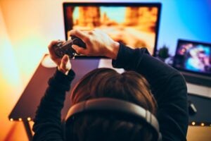 discreet shot of a teenager playing video games